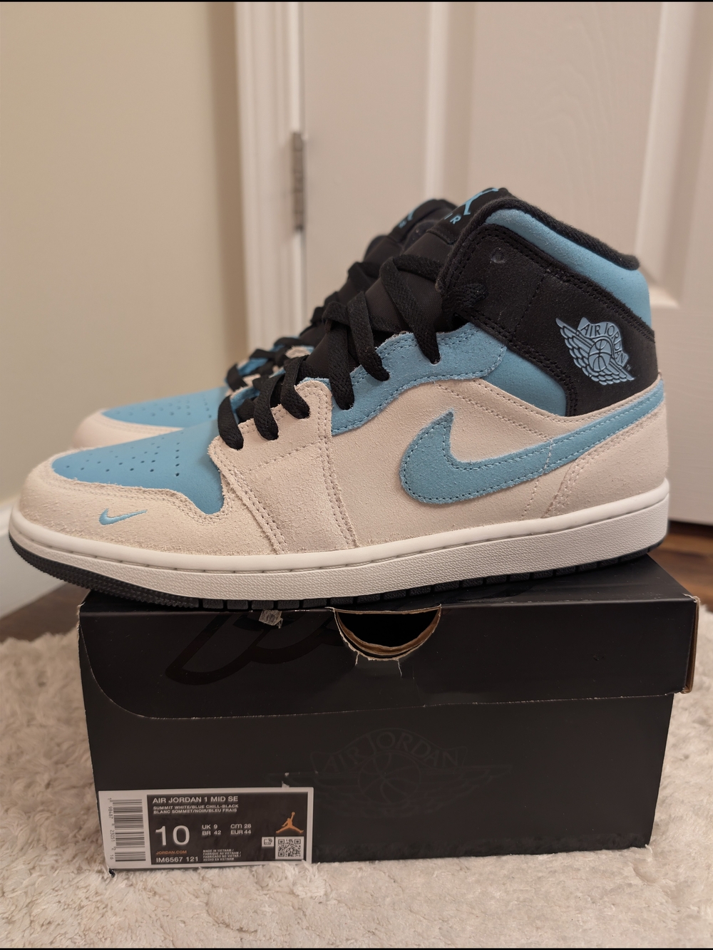 Air Jordan 1 Mid Blue/White/Black Sneakers